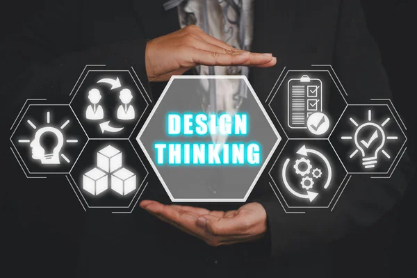 Design thinking concept, Businesswoman hand holding design thinking icon on virtual screen.