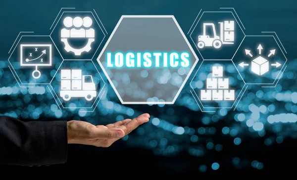 Logistics concept, Businessman hand holding logistics icon on virtual screen.