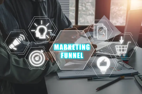 Marketing funnel concept, Business team  analyzing income charts and graphs with marketing funnel icon on virtual screen.