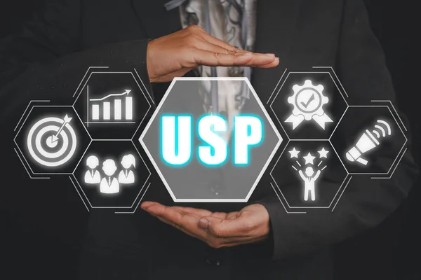 USP, Unique Selling Proposition concept, Business woman hand holding Unique Selling Proposition icon on virtual screen.