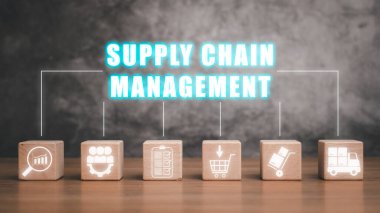 Supply chain management concept, Wooden block on desk with supply chain management icon on virtual screen. clipart