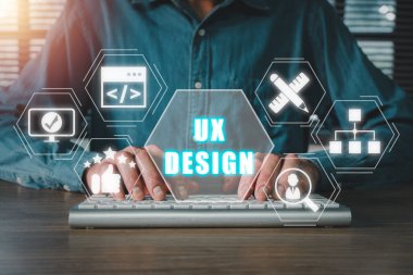UX tasarım konsepti, Klavye bilgisayarında el yazısı ve sanal ekranda UX tasarım simgesi.