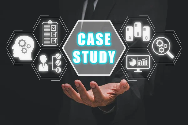 Case study concept, Businessman hand holding case study icon on virtual screen.