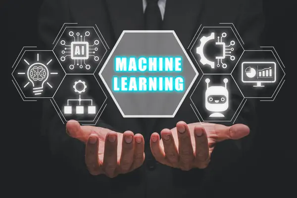 Machine learning concept, Businessman hand holding machine learning icon on virtual screen, AI, Data exchange, deep learning, Science and artificial intelligence technology.
