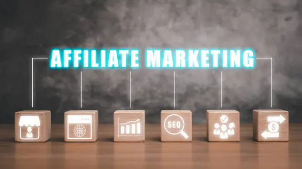 Affiliate marketing concept, Wooden block on desk with affiliate marketing icon on virtual screen, online business model, Generated revenue by rewarding affiliates for referring customers.