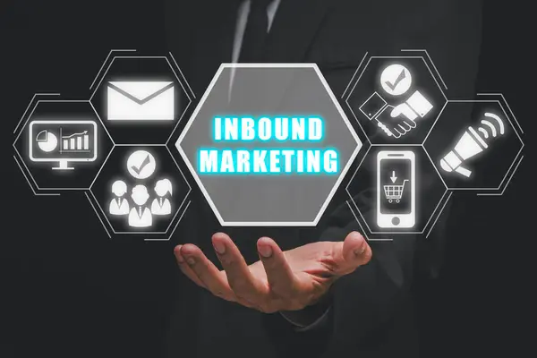Inbound marketing concept, Businessman hand holding inbound marketing icon on virtual screen, Web Pages, Social, Call to Action, Attracting potential customers.