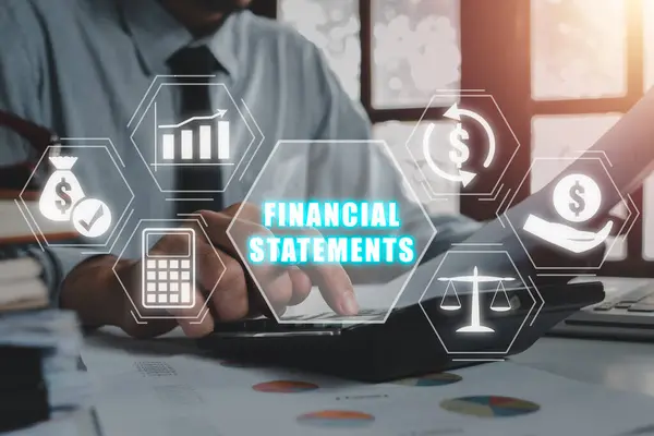 Financial statements concept, Businessman using calculator and analyzing income charts and graphs on office desk with financial statements icon on virtual screen.