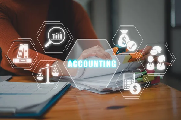 Accounting concept, Business woman analyzing income charts and graphs on office desk wih accounting icon on virtual screen.