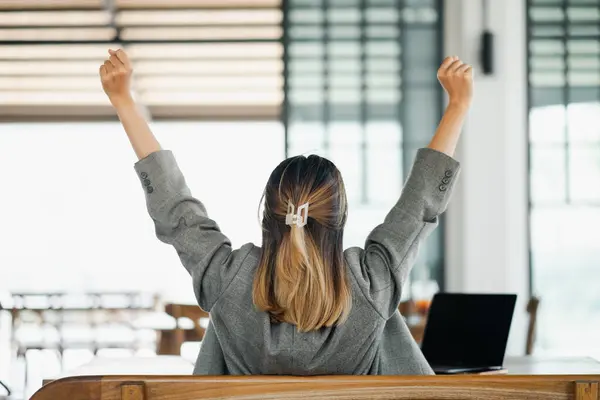 View Businesswoman Raised Arms Victory Celebrating Success Her Desk Laptop Stock Photo