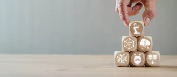 stock image Industry 4.0 concept, Hand holding wooden block on desk with Industry 4.0 icon on virtual screen.