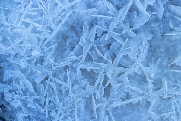 Winter ice surface on Daugava river in Latvia. Ice texture blue background