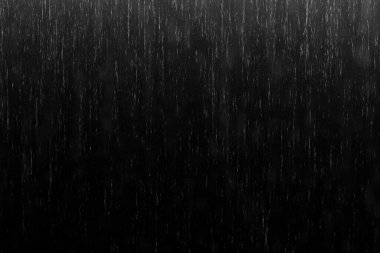 Siyah arkaplanda yağmur damlaları. 
