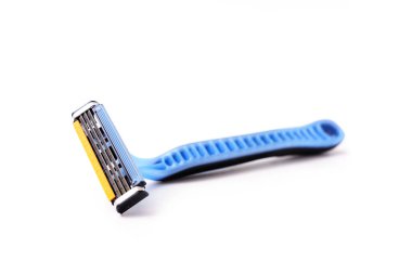 Blue razor isolated on white background, selective focus