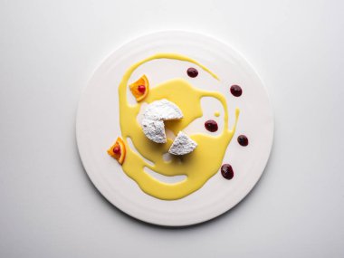 top view plate with dessert on eggnog cream