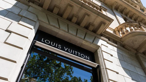 stock image Spain, Barcelona - May 3, 2023: Louis Vuitton signage in front of store.