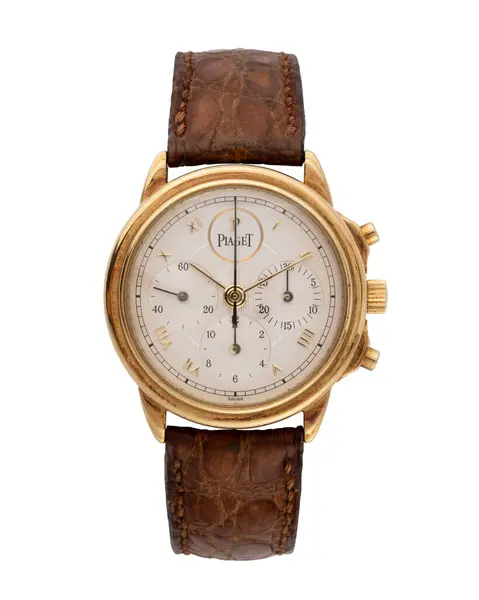 Piaget saat, Gouverneur model, manuel sarmalı, 18 kt sarı altın çantalı. 1990 yılı. Beyaz arka plan. Milan mı? İtalya _ 10 Ağustos _ 2024