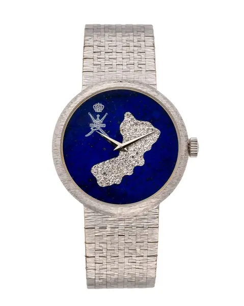 Piaget 18kt beyaz el yapımı saat, Umman haritasında 1980 'lerde elmas arama. Beyaz arka plan. Milan mı? İtalya _ 10 Ağustos _ 2024