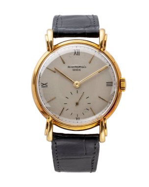 Patek Philippe saat, Calatrava modeli, referans 1571. Elle kumandalı saat, 18 kt sarı altın çanta. Beyaz arka planda. Milan mı? İtalya _ Eylül 18 _ 2024