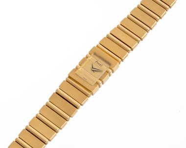Piaget saati, Lady Polo modeli, referans 15201 C701. Entegre bileziği olan 18 kiloluk sarı bir çanta. Milan mı? İtalya 14 Nisan 2025