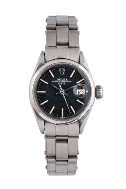 Rolex Oyster Perpetual Date 'in yakın çekimi, referans 6516. Çelik bir çanta ve siyah kadranlı otomatik kol saati. Milan mı? İtalya 16 Nisan 2025