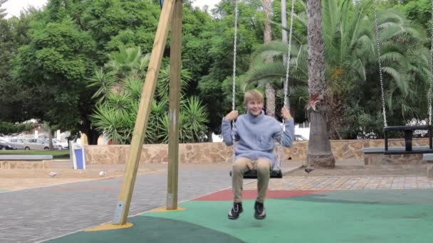Teenager Boy Swing Playground Sunny Day Cheerful Child Flies High — Stock Video