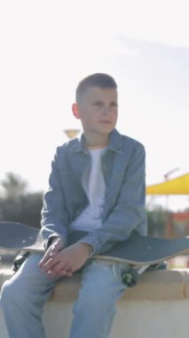 young boy on a skateboard.