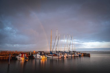 Sunrise at Boddenhafen Bodstedt on the Baltic Sea clipart