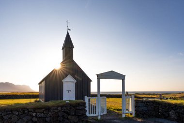 Black Church Budhir at Budir Snaefellsness Bakirkja in Iceland clipart