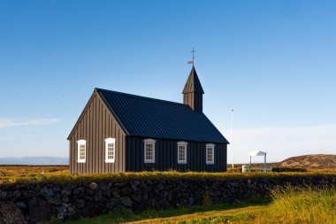 Black Church Budhir at Budir Snaefellsness Bakirkja in Iceland clipart