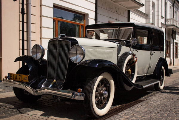 14.06.2023 Bialystok Poland.Retro automobile in the street of the old town,