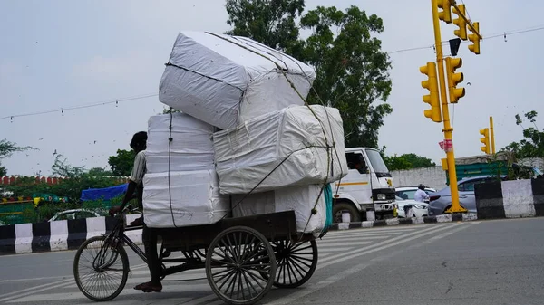 Stock photo of Typical rural transport, overloaded van with people,  Maharashtra, India. Available for sale on