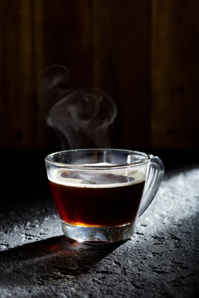 Stock image espresso cup on black background, Colombian coffee