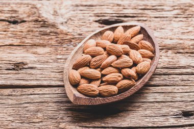 pile of natural almonds (Prunus dulcis) close-up image