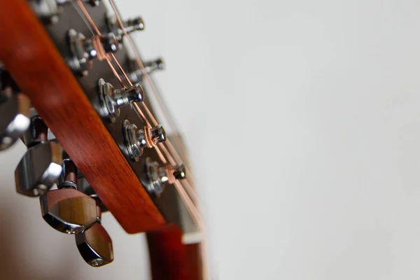 Guitar strings. Guitar body. Selective focus. close-up.