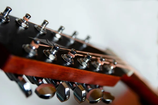 Guitar strings. Guitar body. Selective focus. close-up.