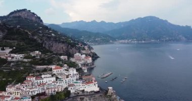 Beautiful and unique cinematic aerial view of luxury and exclusive resort area. Flying around the fortress on the coast of Atlantic Ocean, Mediterranean Sea. Urbanisation in the most expensive area 