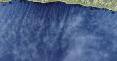 Fog morning over the plain lake floodplain of the meadow. Sunrise rays shining through branches in summer morning. Sunrise in the misty forest. Calmness, relaxation, meditation, beauty of nature.