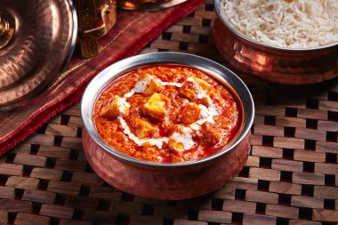 Butter daal makhani with white rice served in dish isolated on table side view of middle east food clipart