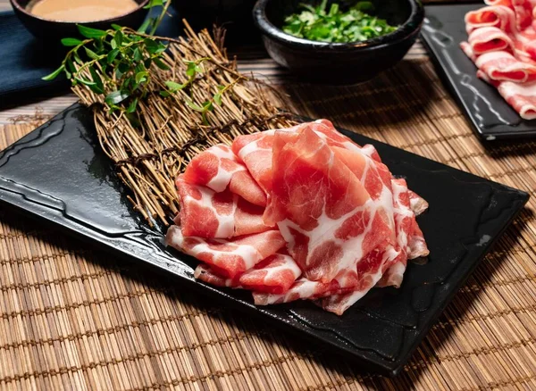 Taiwan Pork Plum Blossom raw served in tray isolated on table top view of taiwan food