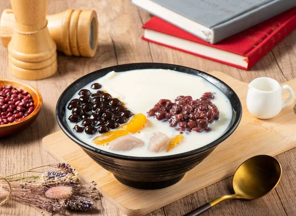 Taiwan sweet, tofu and beans and soy milk pudding served in bowl isolated on table top view of asian food