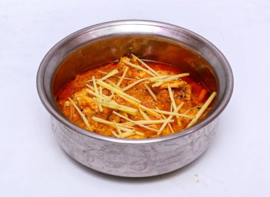 chicken ginger handi served in dish isolated on grey background top view of pakistani food clipart