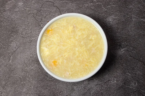 Chicken Corn Soup served in bowl isolated on background top view of bangladesh food
