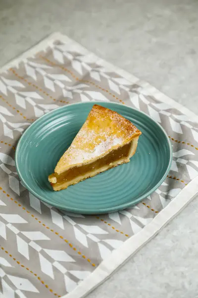 Apple Pie Slice served in plate isolated on napkin side view of cafe baked food on background