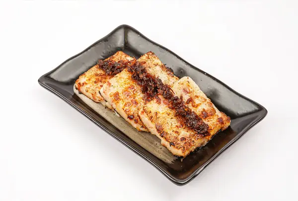 stock image Carrot Cake with XO Sauce served in tray isolated on grey background side view of chinese food