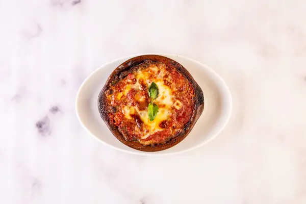 stock image Eggplant Parmigiana pizza served in dish isolated on grey background top view of italian fastfood