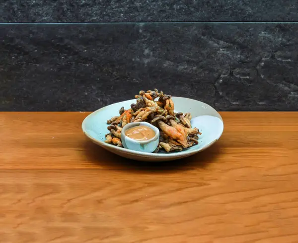 stock image Tempura Shimeji Mushroom with mayo dip served in dish isolated on wooden table side view of italian fastfood