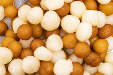 Bebek Sweets Mini Gulab Jamun ve Rasgulla dokusu Hint Pakistanlı ve Bangladeş tatlı tatlısının üst görüntüsü.
