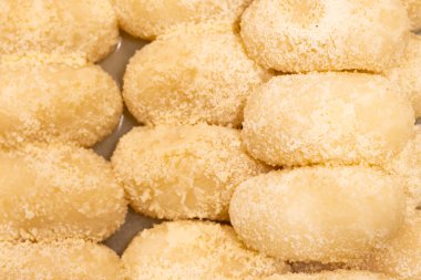 White ChumChum or ChumChum laddo texture closeup top view of indian, pakistani and bangladeshi sweets dessert clipart