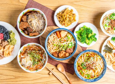 Colorful Steamed Dumplings, Angelica Vermicelli, Rice Noodles Soup, Vegetarian Noodle, beef Noodles, dan dan noodle with mince meat, broccoli, Fried sauerkraut, braised cabbage, lu rou fan top view clipart