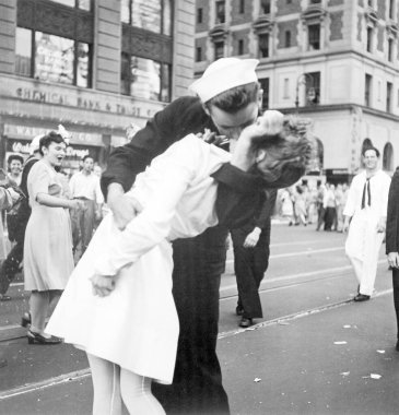 USA. 1945. Iconic, Kissing the War Goodbye. Sailor and a nurse kiss. B&W Restored. Photograph taken in Times Square, New York City, in 1945. It immortalizes the spontaneous, heartfelt kiss, symbolizing the World War II came to an end. Joy and relief clipart